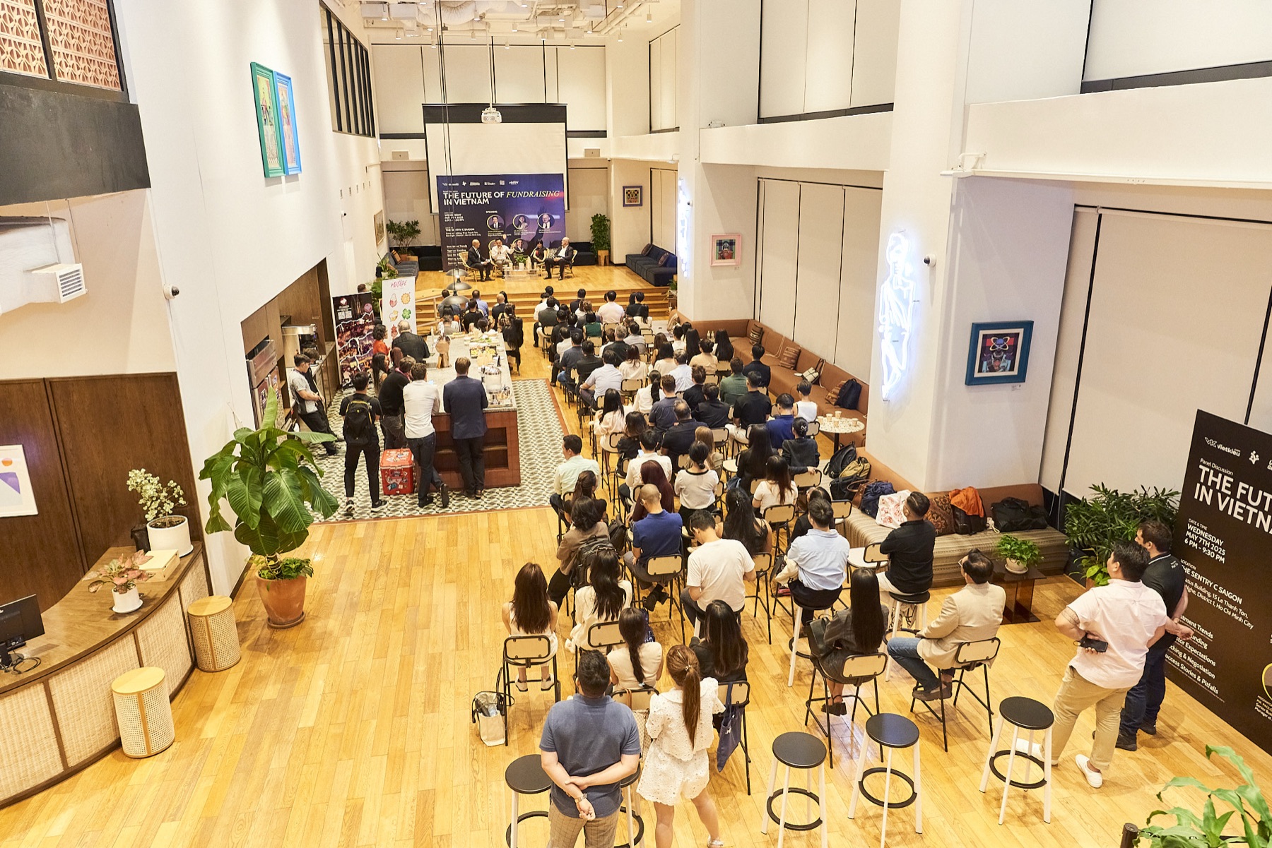 A full room at a panel event