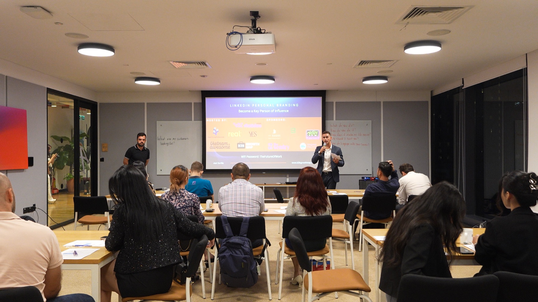 A speaker presenting at a workshop